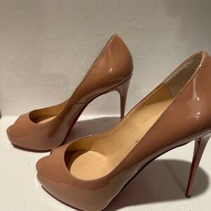 Gently used beige Christian Louboutin stilettos red bottoms 39 1/2 size peep toe